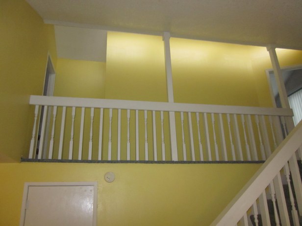 View of the upstairs "loft" which needs to be repainted and recarpeted